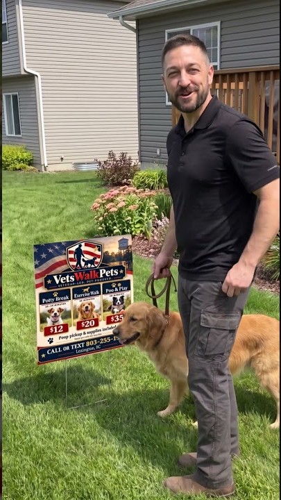 James Vetter standing with a golden retriever beside a VetsWalkPets yard sign